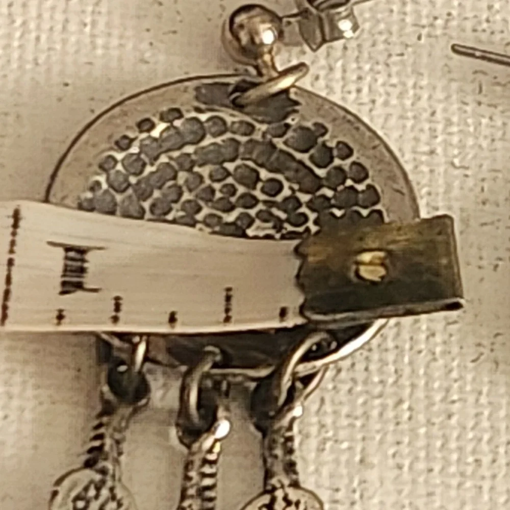Southwestern Etched Pottery and Feather Dangle Post Earrings Silver Tone